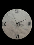 Orologio in marmo bianco
